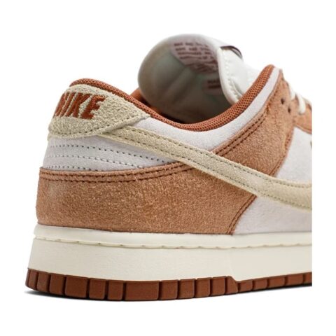 Nike sneaker with brown and white